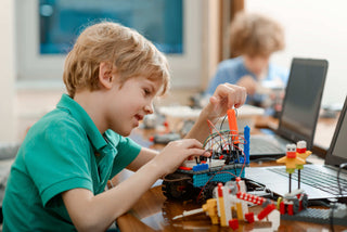 Kids playing with STEM toys